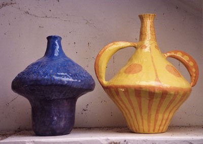 Design and make a clay vessel using kiln clay. The shape and decoration of the vessel should exhibit the influence of abstract art.